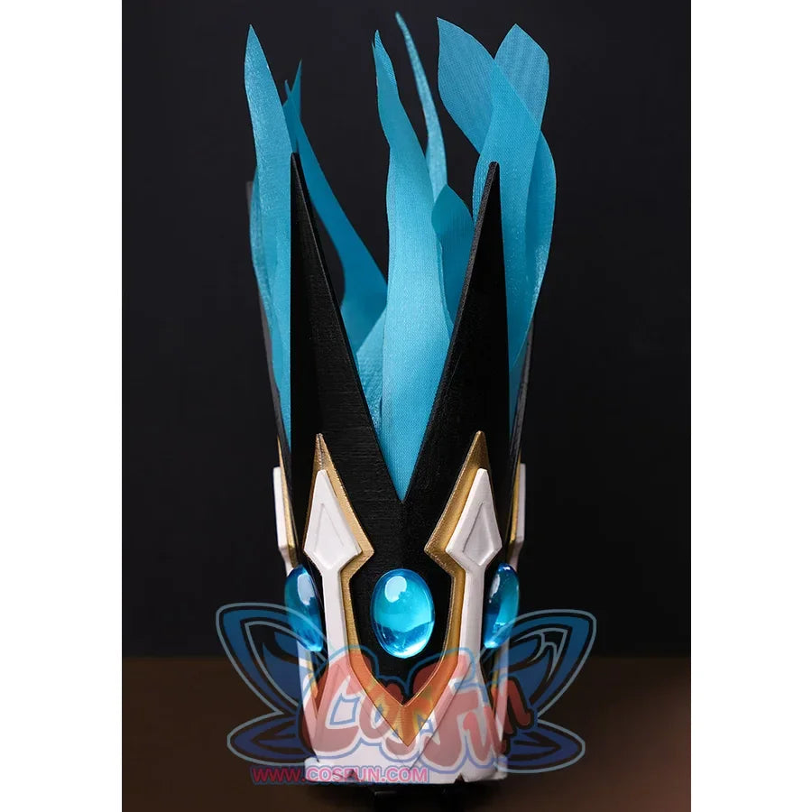 The crown&#39;s main body is black, with gold outline and white base, several blue gems are embedded in the black and gold structure, and there is a blue feather-like material on the top.