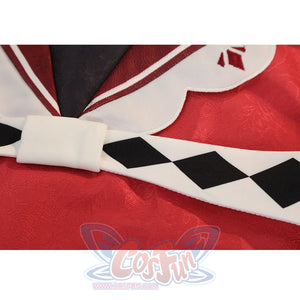 Sparkle cosplay waist detail with white bow accent, checkered belt, and red cape fabric