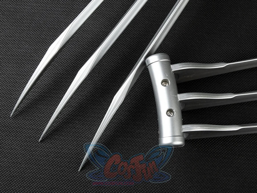 Wolf Claw Silver Blade cosplay prop balances a full silver claw set over a visible hand grip base.