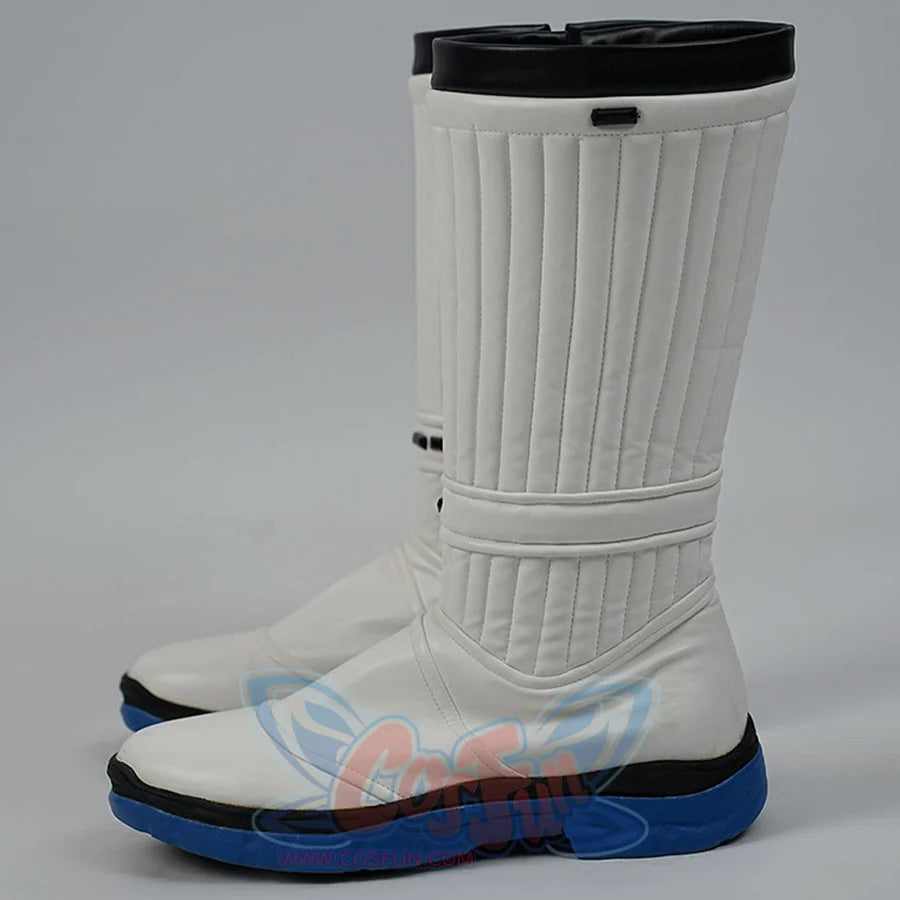 White chef boots with black soles on a gray background