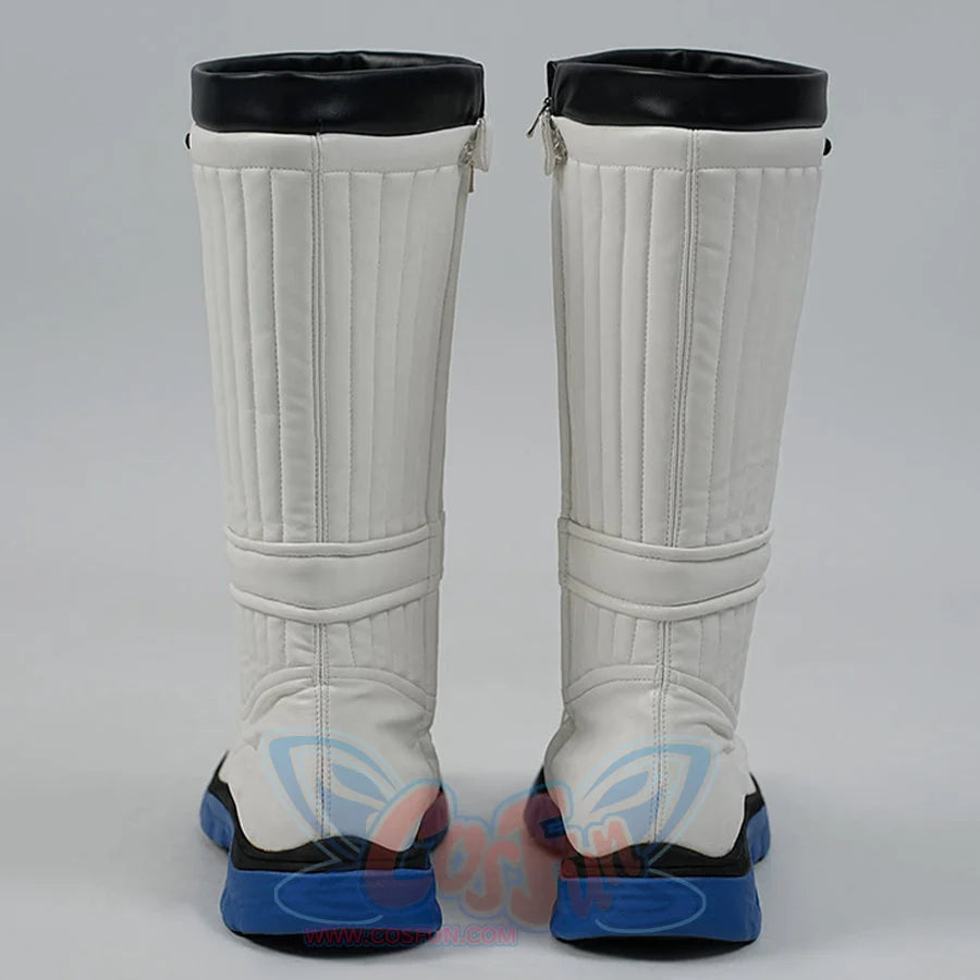 White knee-high boots with black tops and blue soles on a gray background