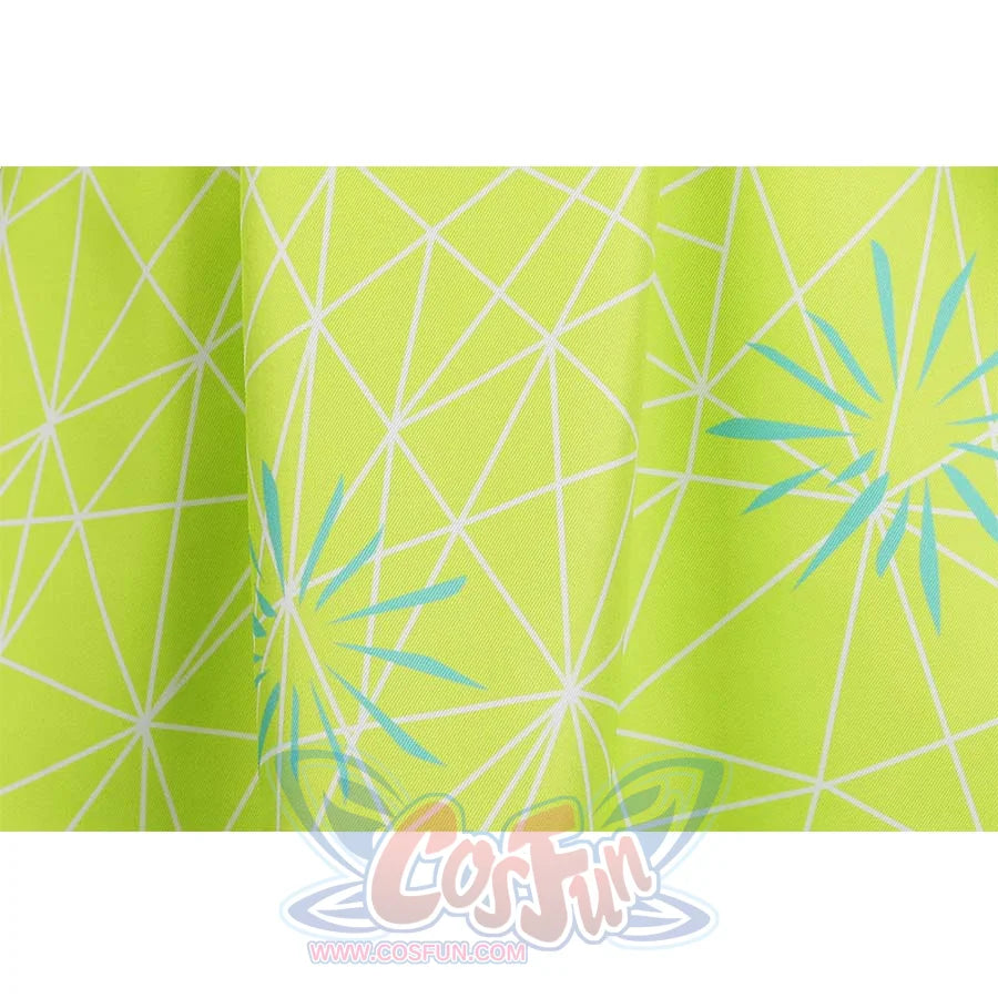 Extreme close - up of the fabric pattern of the Joy cosplay dress, showcasing the intricate blue geometric designs on the bright green background.