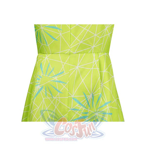 Close - up of the waist area of the Joy cosplay dress, showing the light green fabric with white geometric lines and turquoise floral - like patterns.