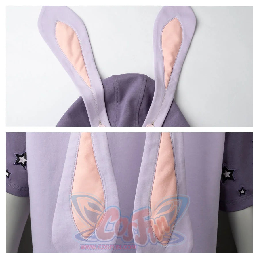 Close - up of the bunny ears on the hood. The ears have pink inner linings, attached to the light purple hood, adding a cute element.