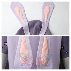 Close - up of the bunny ears on the hood. The ears have pink inner linings, attached to the light purple hood, adding a cute element.