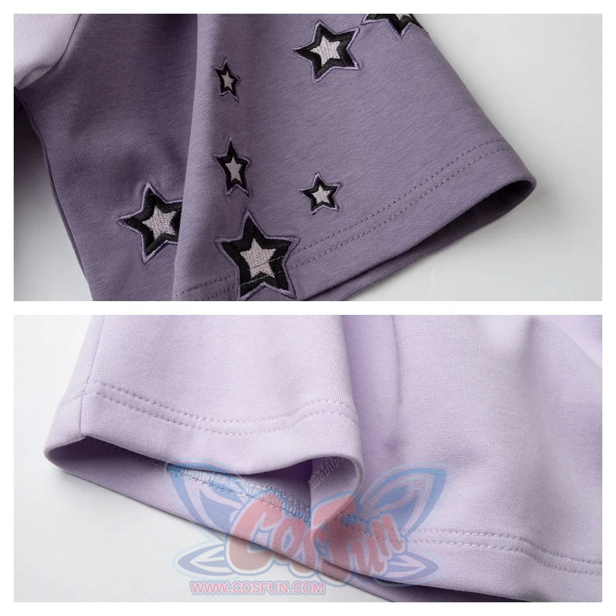 Close - up of the sleeves. The upper part has star embroidery, and the lower part shows the stitching detail of the light purple fabric. Highlights the decorative and quality aspects.