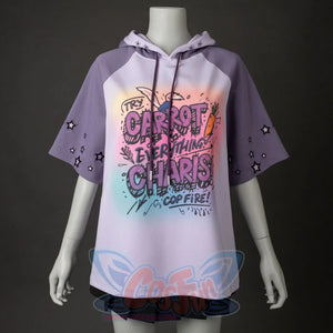 Displayed on a mannequin, the hoodie shows its loose fit. The graphic print and star - adorned sleeves are clearly visible, paired with a black skirt.