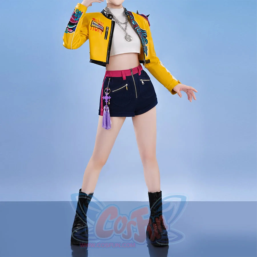 Cosplayer wearing Rumi cosplay costume with yellow jacket, crop top, and shorts in a KPop streetwear-inspired look.