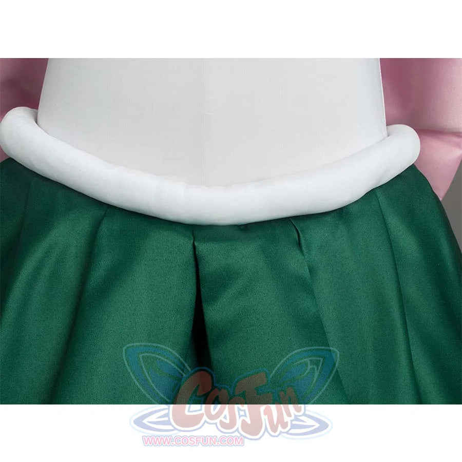 Close - up of the white waist trim and green pleated skirt, highlighting the waist and skirt design.