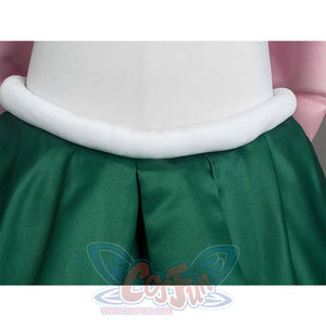 Close - up of the white waist trim and green pleated skirt, highlighting the waist and skirt design.