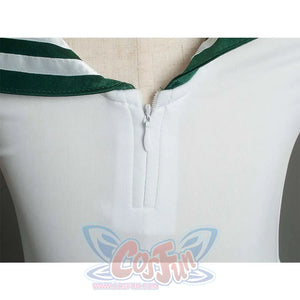 Close - up of the zipper detail on the white bodice of the costume.