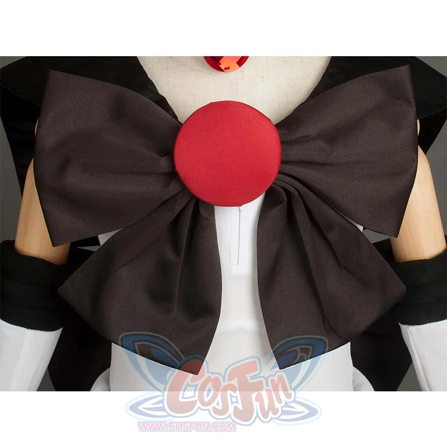 Close - up of the large black bow with a red round center on the front of the costume, showcasing decorative details.