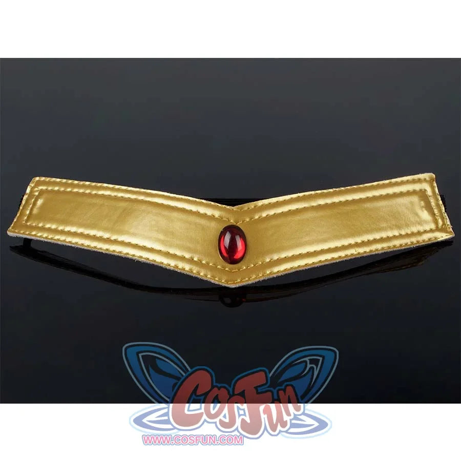 Close - up of the gold - colored brooch with a red gem of the Kid Cosplay Sailor Pluto costume.