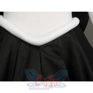 Close - up of the white waist trim and black pleated skirt, highlighting the waist and skirt design.