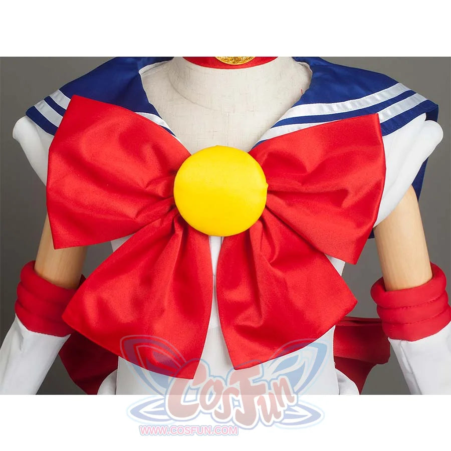 Close - up of the large red bow with a yellow round center on the front of the costume, showcasing decorative details.