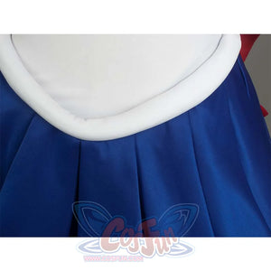 Close - up of the white waist trim and blue pleated skirt, highlighting the waist and skirt design.