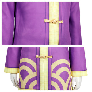 Close - up of the Kung Fu Peach costume’s top, showing purple fabric, yellow trim, traditional buttons, and golden patterns.