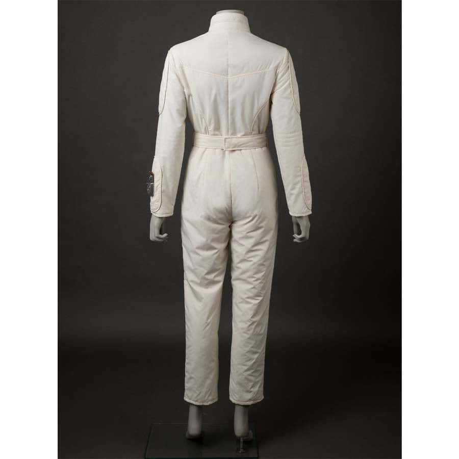 Back view of the jumpsuit, highlighting the belt and the attached accessory on the sleeve. Shows the jumpsuit&#39;s back design.