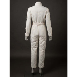 Back view of the jumpsuit, highlighting the belt and the attached accessory on the sleeve. Shows the jumpsuit's back design.