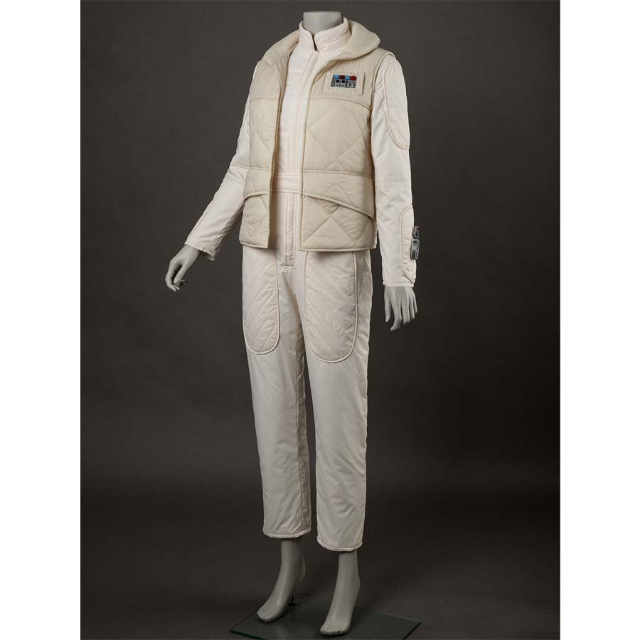 Side view, emphasizing the overall design. Highlights the quilted pattern of the vest and jumpsuit, along with the rank insignia.