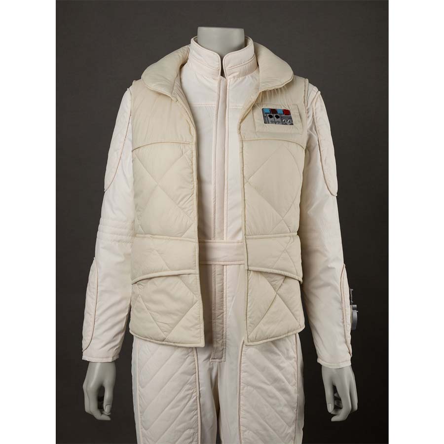 Close - up front view of the vest over the jumpsuit, emphasizing the rank insignia and the quilted pattern.