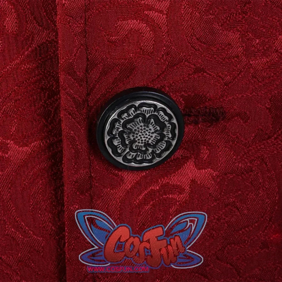 Extreme close-up of the ornate, embossed button on the red patterned vest of the Lies of P cosplay costume.
