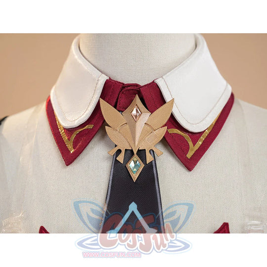Genshin Impact Linnea cosplay collar detail with golden bird brooch and dark tie close-up
