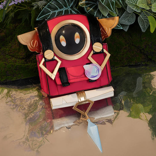 Genshin Impact Linnea cosplay red Nod-Krai backpack with gold accents and blue crystal pendant, displayed outdoors