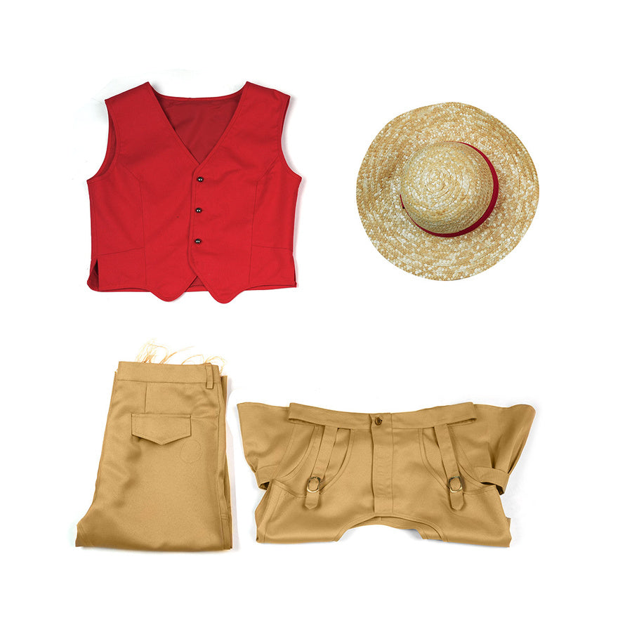 Flat lay of the complete Luffy cosplay costume set including red vest, straw hat, and two tan pants.