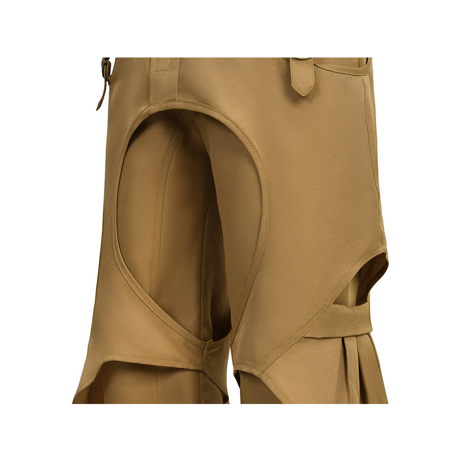 Close-up of the circular thigh cutout design on the tan pirate pants in the Luffy cosplay costume.