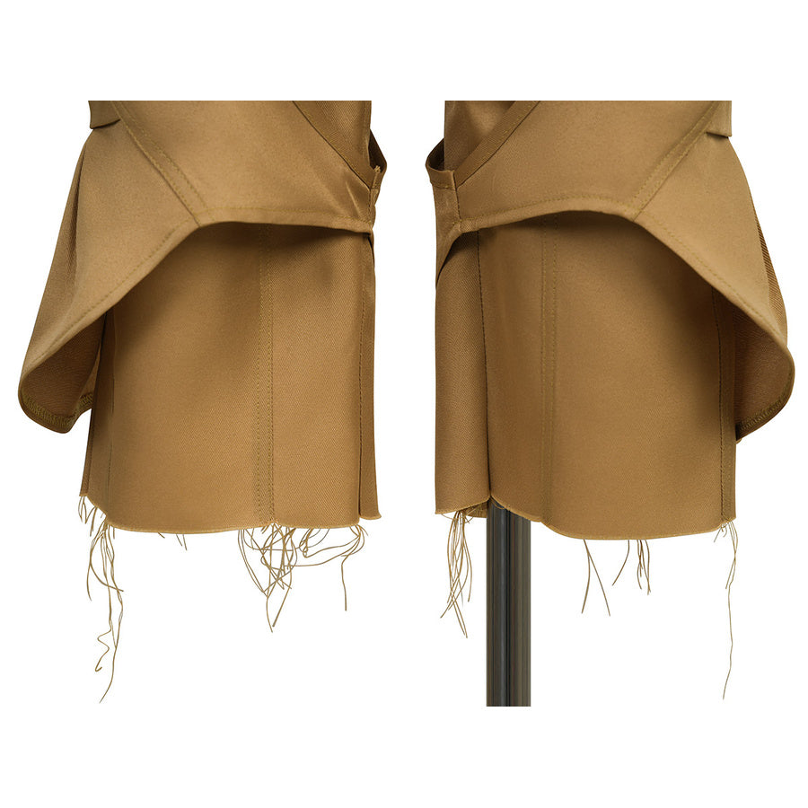 Close-up of the frayed fringe hem at the bottom of the pirate pants in Luffy cosplay costume.