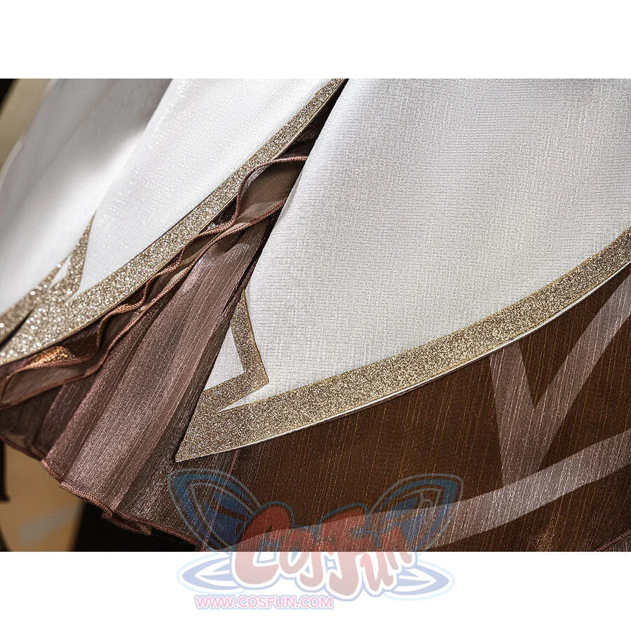 Genshin Impact Traveler Lumine cosplay skirt layers gold glitter trim over brown pleated underskirt and sheer overlay.