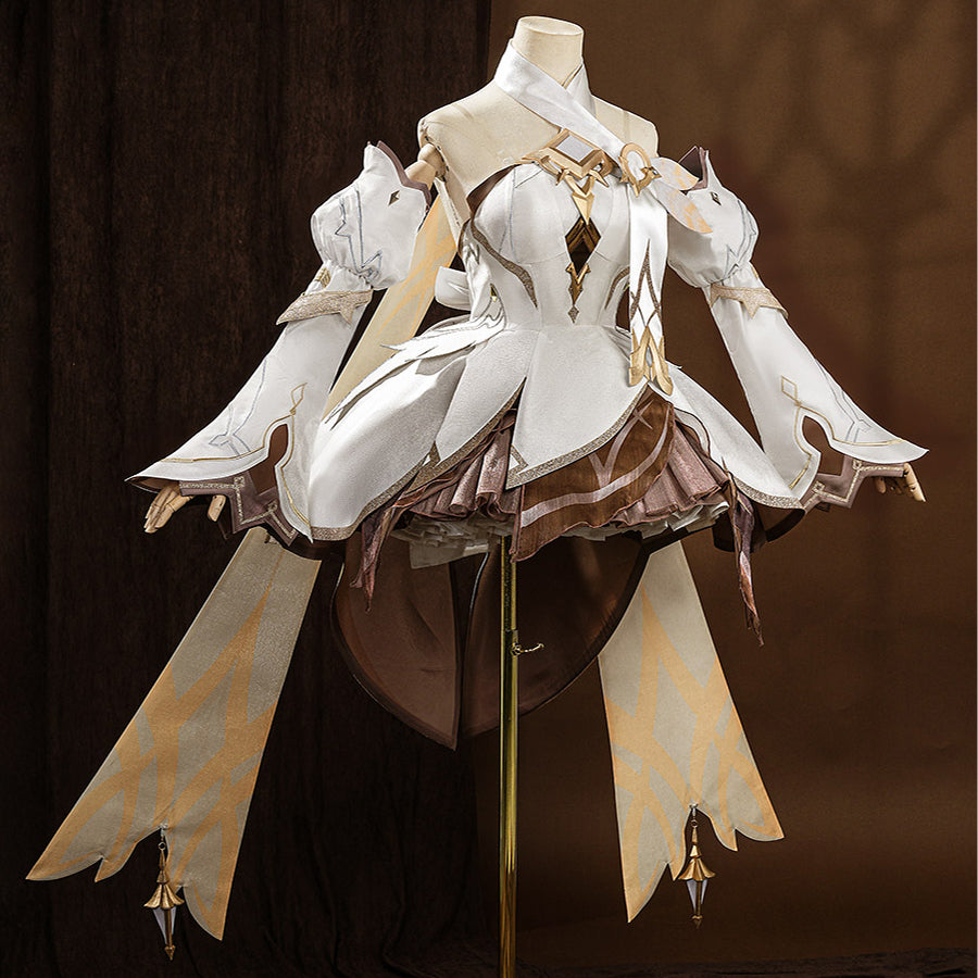 Lumine cosplay costume upper body detail with gold embroidery, diamond chest piece, and white top