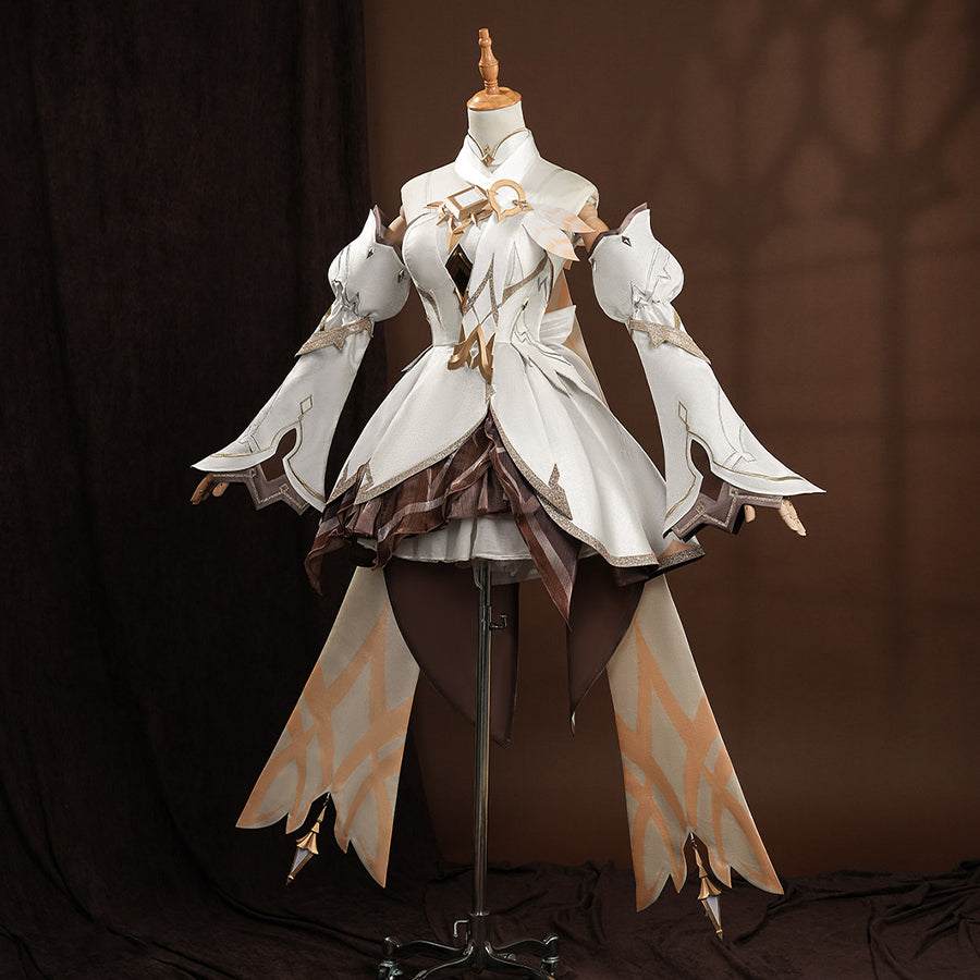 Front view of Lumine cosplay costume on mannequin, white top with gold details and brown layered skirt
