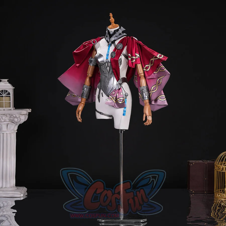 Displays the side of Lupa’s costume, highlighting the silver chest armor, cape details, and matching arm accessories.