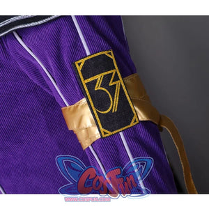 A shiny golden band wraps around the sleeve, A rectangular black patch with a gold border is sewn onto the sleeve, featuring the number “33” in a stylized.