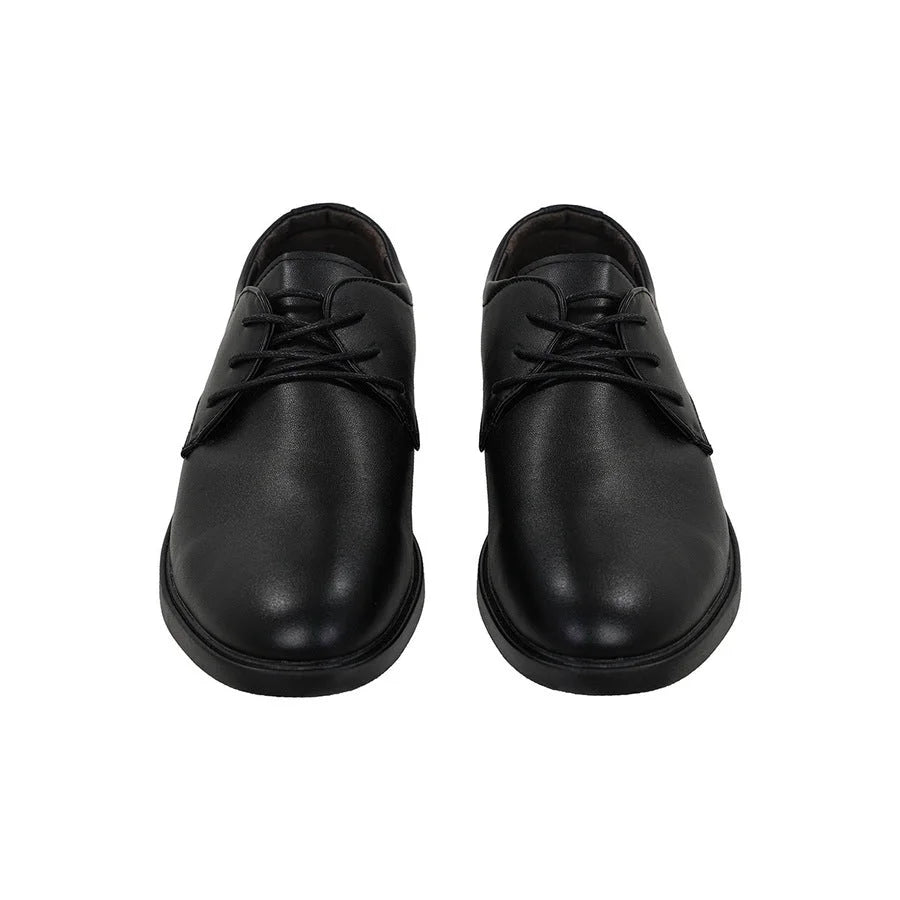 Black faux leather dress shoes for Max Eisenhardt cosplay, shown from front with both toes facing forward