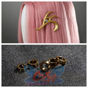 Features a gold hairpin with a pearl detail on pink hair, paired with sleek gold ear clips on a dark textured surface.