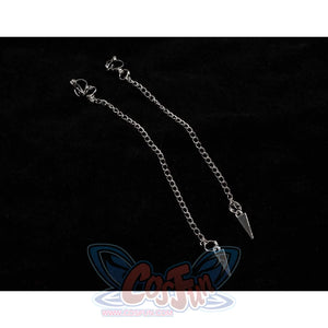 Close - up of two silver chains with pointed pendants, part of Mira’s cosplay accessories.