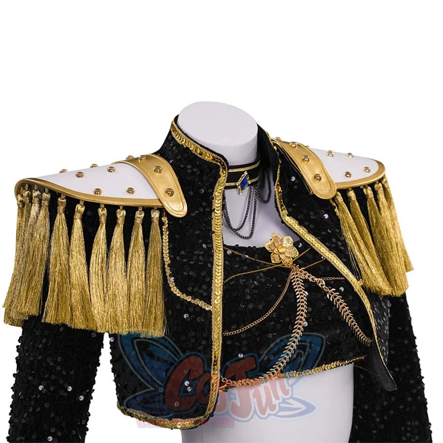 Close - up of the jacket and top. Features gold tassels, sequins, layered necklaces, and a decorative flower, highlighting intricate craftsmanship.