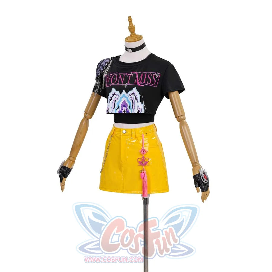 Highlights the intricate shoulder design of Mira’s tee, the skirt’s patent - leather finish, and the pink tassel accessory, with updated gloves.