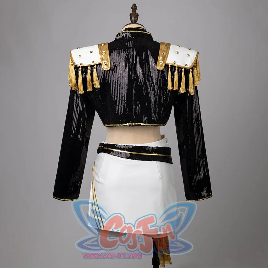 Mira cosplay costume idol stage outfit showcase: The top is a black cropped jacket with sequins, featuring white shoulder pads adorned with gold studs and tassels. The skirt is white, complemented by a black belt with gold trims. 