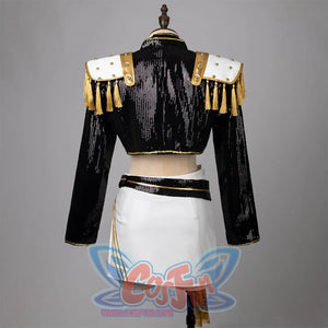 Mira cosplay costume idol stage outfit showcase: The top is a black cropped jacket with sequins, featuring white shoulder pads adorned with gold studs and tassels. The skirt is white, complemented by a black belt with gold trims. 