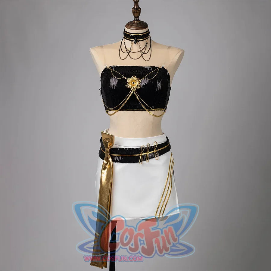 Mira's cosplay set without jacket featuring a black sequin strapless top with gold floral ornament and chains, matching white mini skirt with black sequin belt, gold metal ring accents, flowing gold ribbon, side slit, and gold trim, paired with a chain-decorated choker.