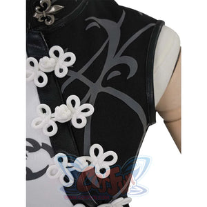 Detail of the black part of the top, showing white knot - like buttons and gray patterns. Highlights the traditional - inspired design elements.