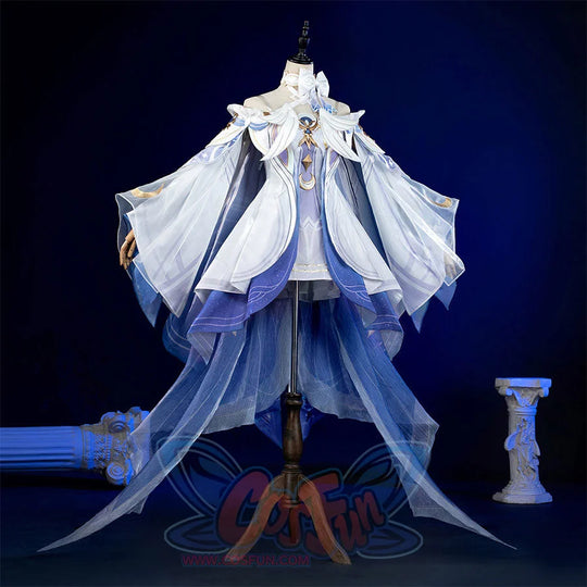 Genshin Impact Columbina cosplay gown balances a gold-gemmed white bodice above navy and light blue tulle skirt.
