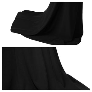 Close - up of the Morticia Addams cosplay gown’s hem, showcasing the flowing fabric and mermaid tail shape, with a white backdrop.