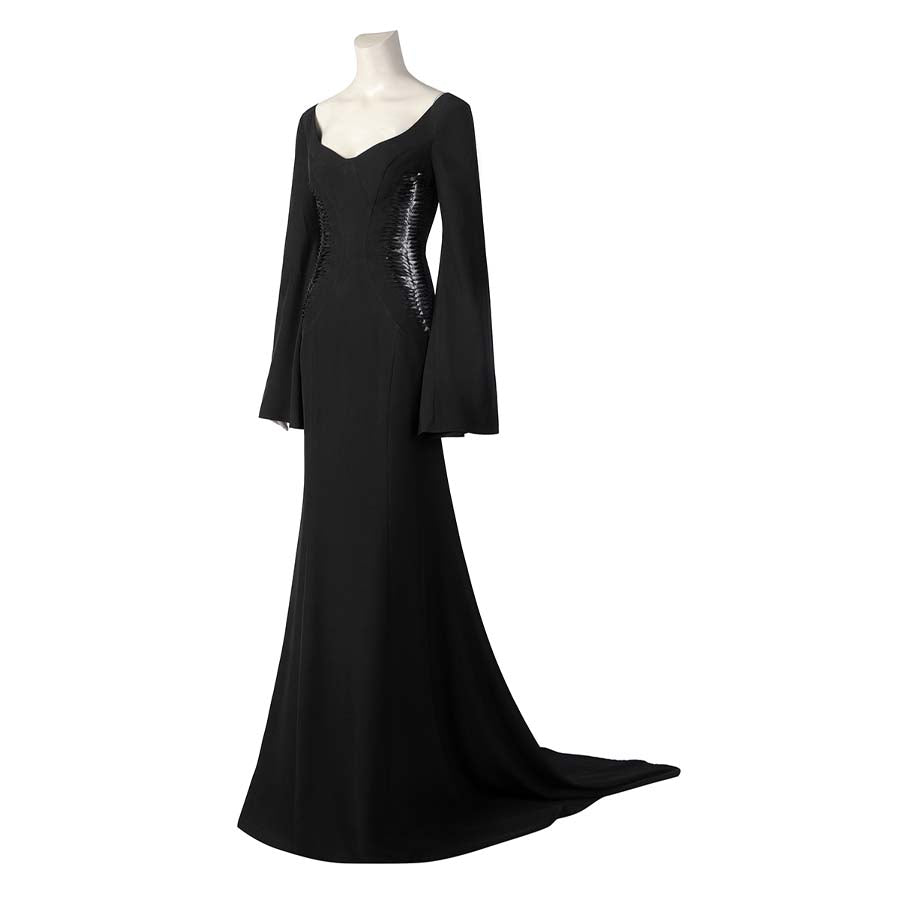 A mannequin displays the Morticia Addams cosplay dress, a long black gown with bell sleeves and side cut - outs, against a plain white background.