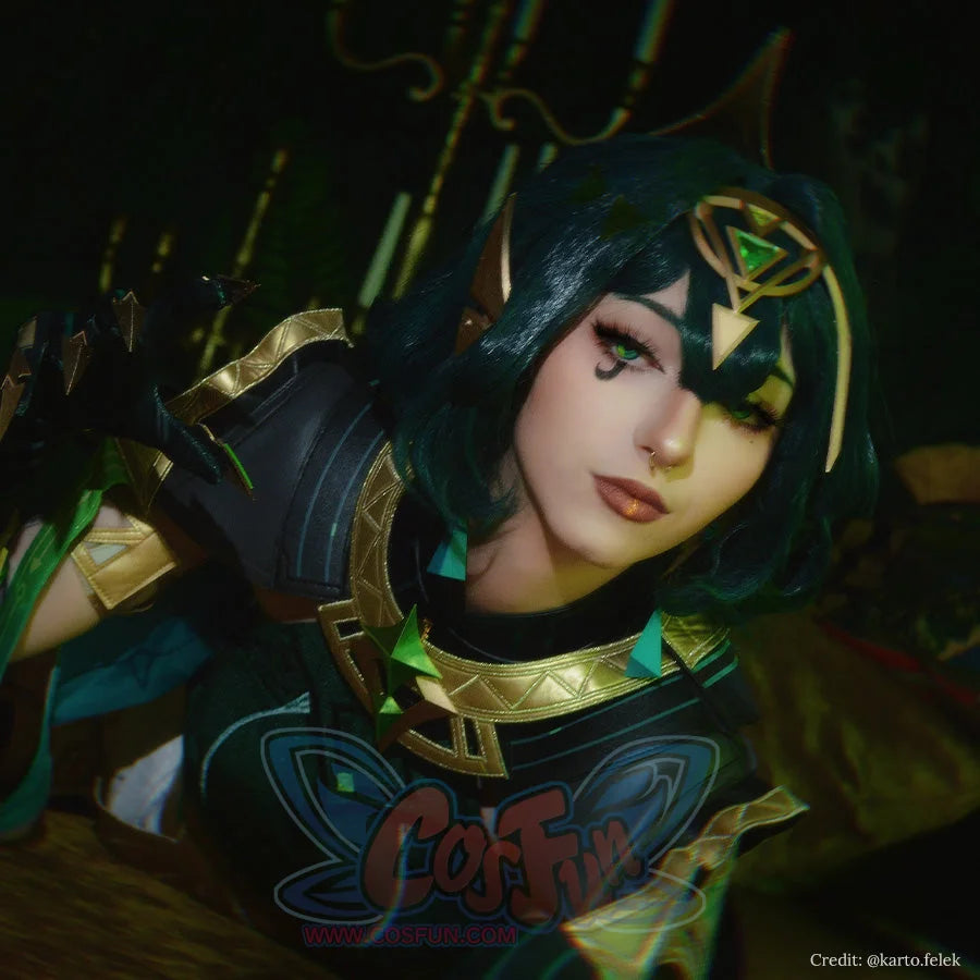 Genshin Impact Nefer cosplay headpiece frames emerald gold geometric accents paired dark armor gold trim.