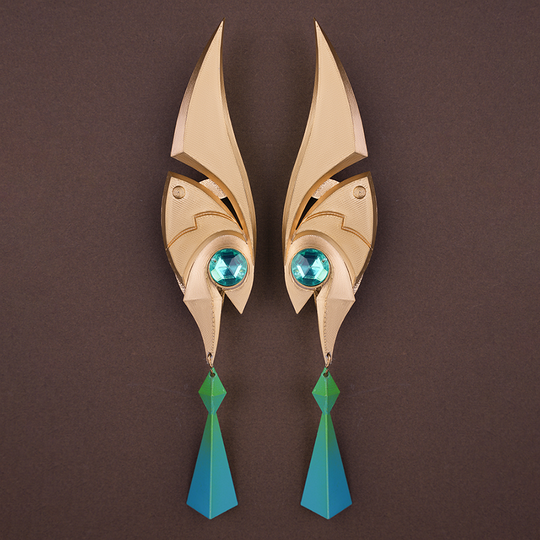 Genshin Impact Nefer Cosplay Costume prop elf ears, mainly golden and green colors.
